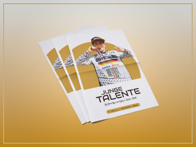 Titelmotiv der Kampagne „Junge Talente 2026“ als gedrucktes Magazin‑Cover in mehrfacher Auslage auf gelb‑weißem Verlaufshintergrund